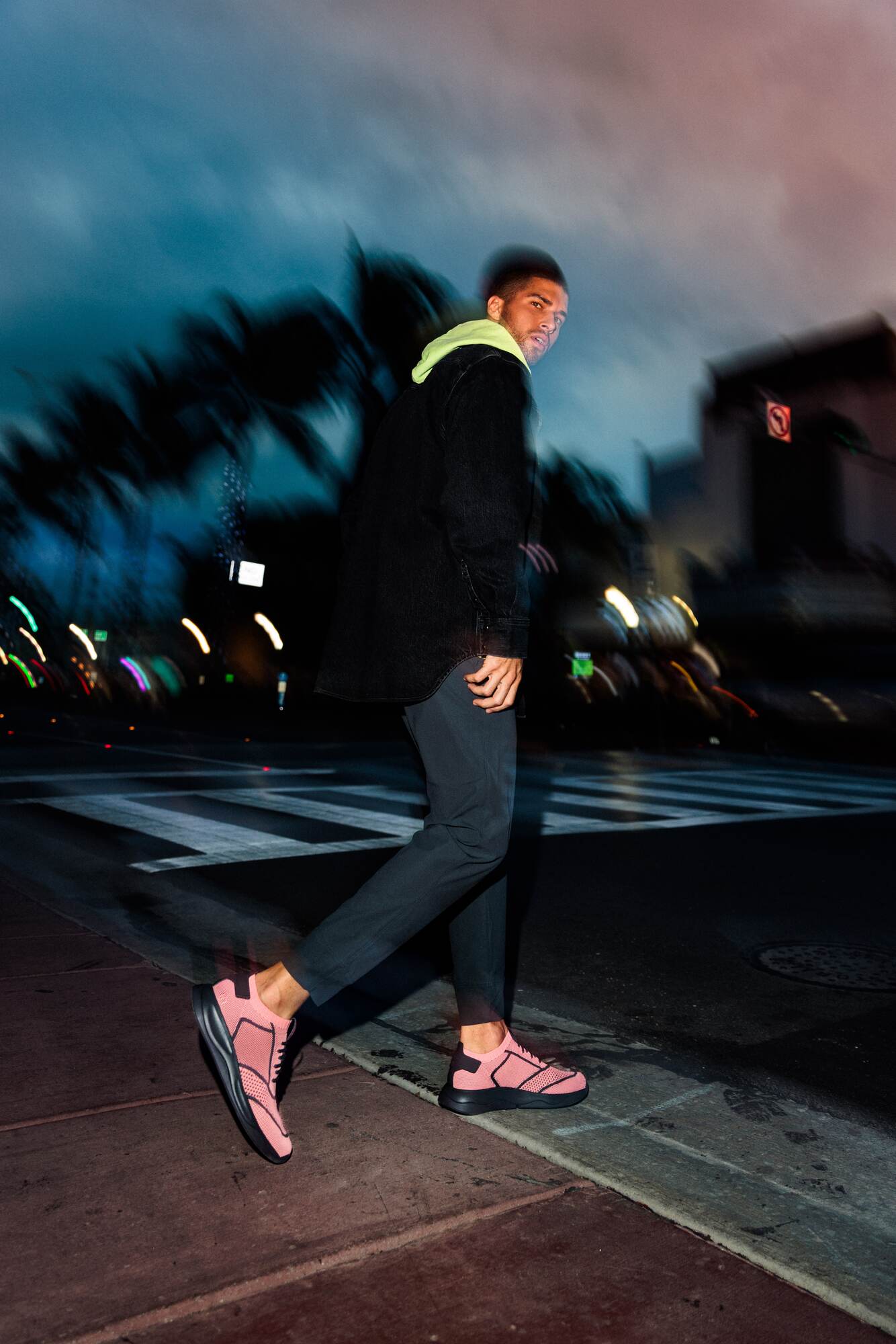 Man wearing IF/THEN Callisto shadow rose crossing the street in Miami